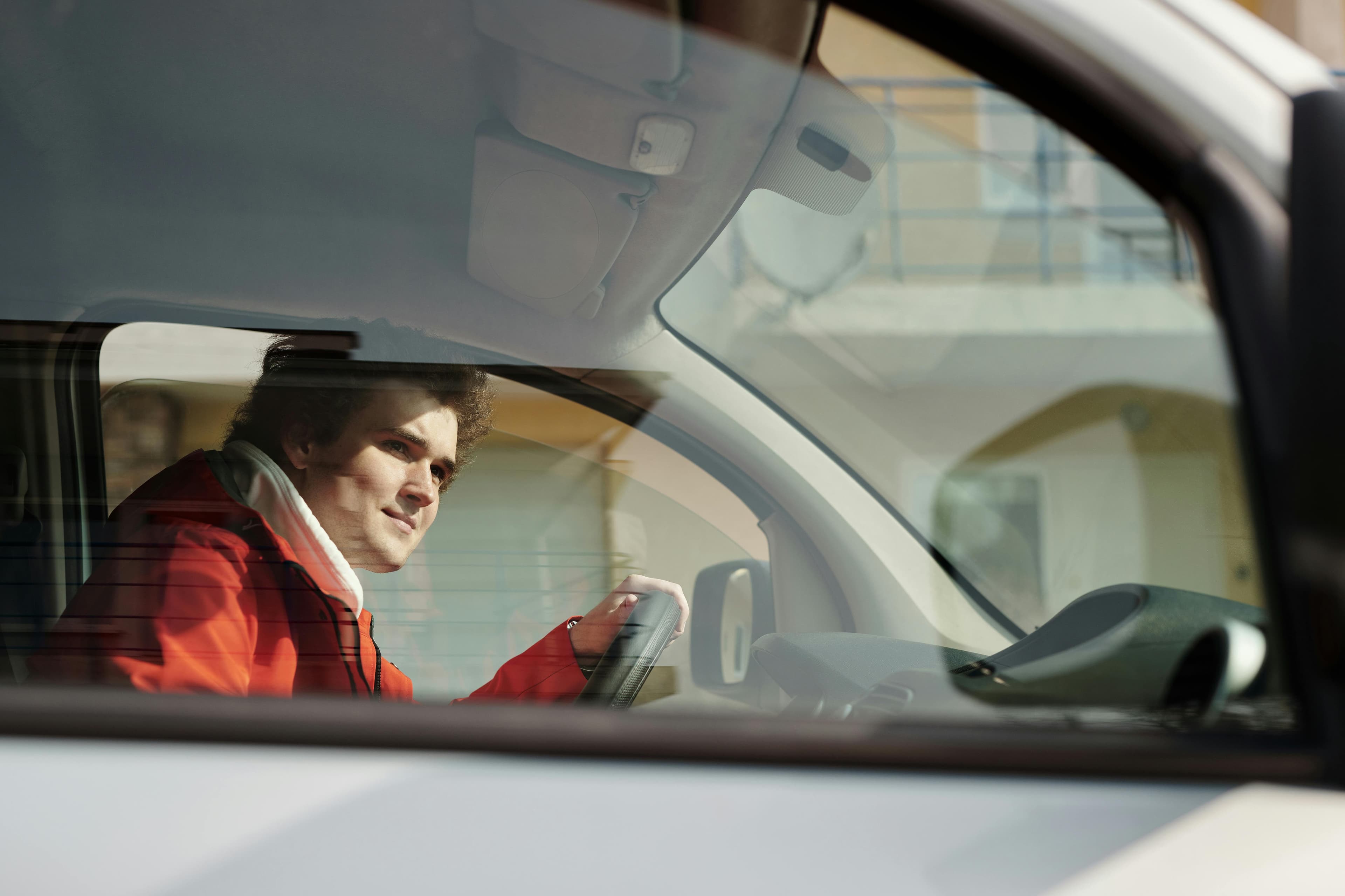 TVDE driver working as extra income after their main job